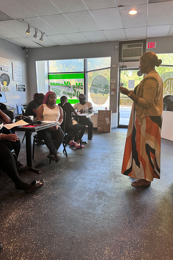 Woman presenting to the Lady Lions